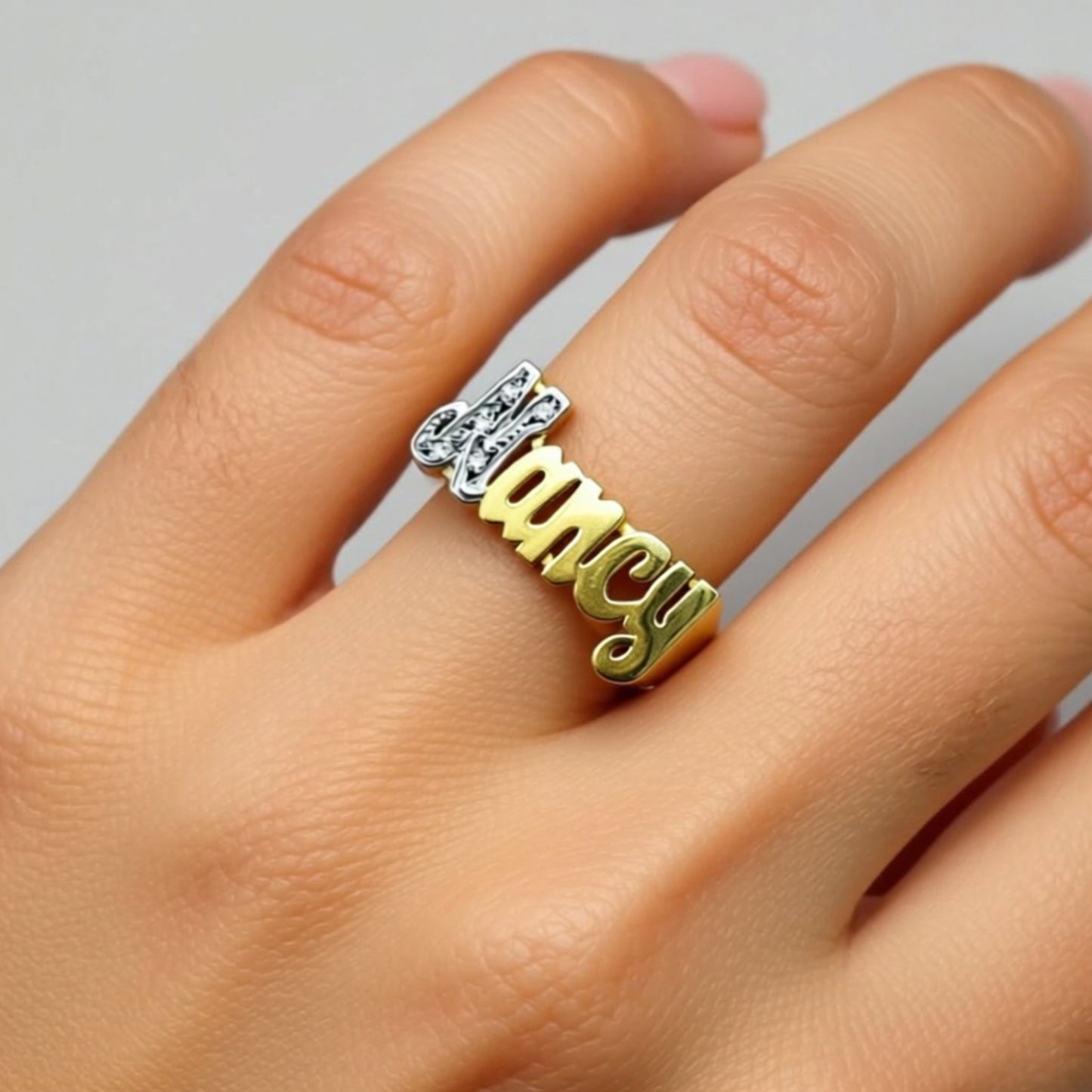 name ring on a hand