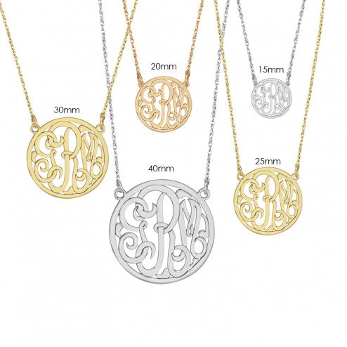 Monogrammed necklace with varying chain lengths on a white background