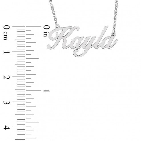 Silver 'Kayla' necklace with a ruler for scale on a white background