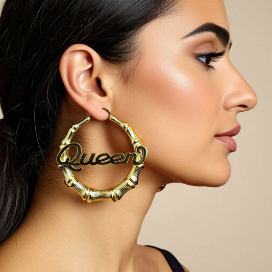 Gold Bamboo Name Hoop Earrings on a woman