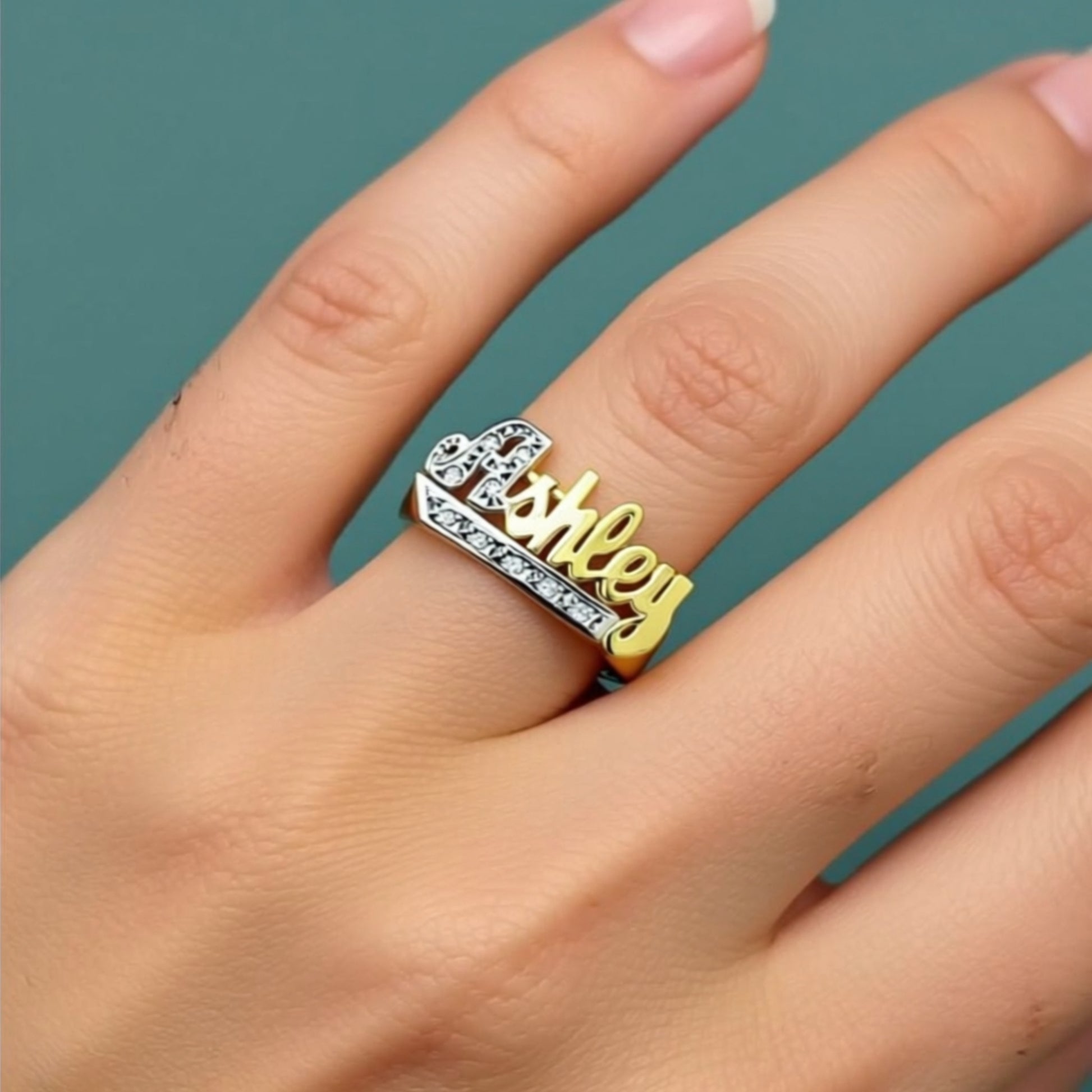 diamond name ring on a hand 2