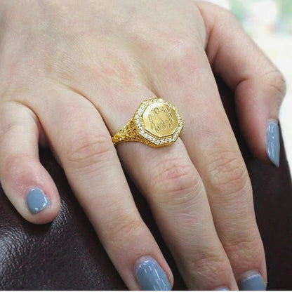 Gold Octagon CZ Filigree Monogram Ring on a person