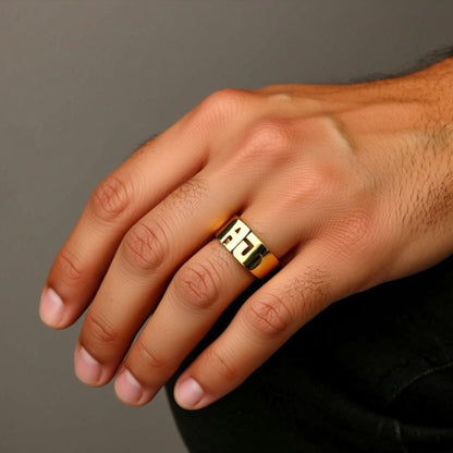 initial_ring_on_a_hand