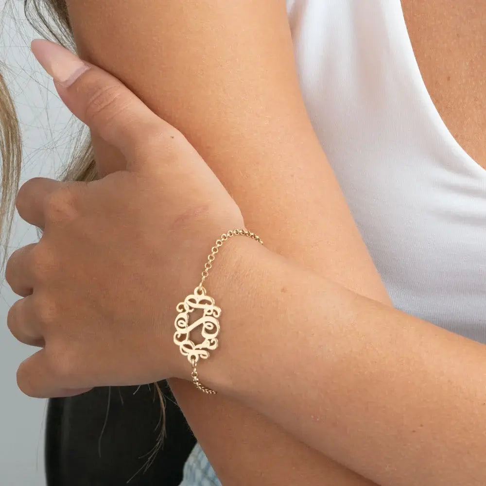 monogram bracelet on a person
