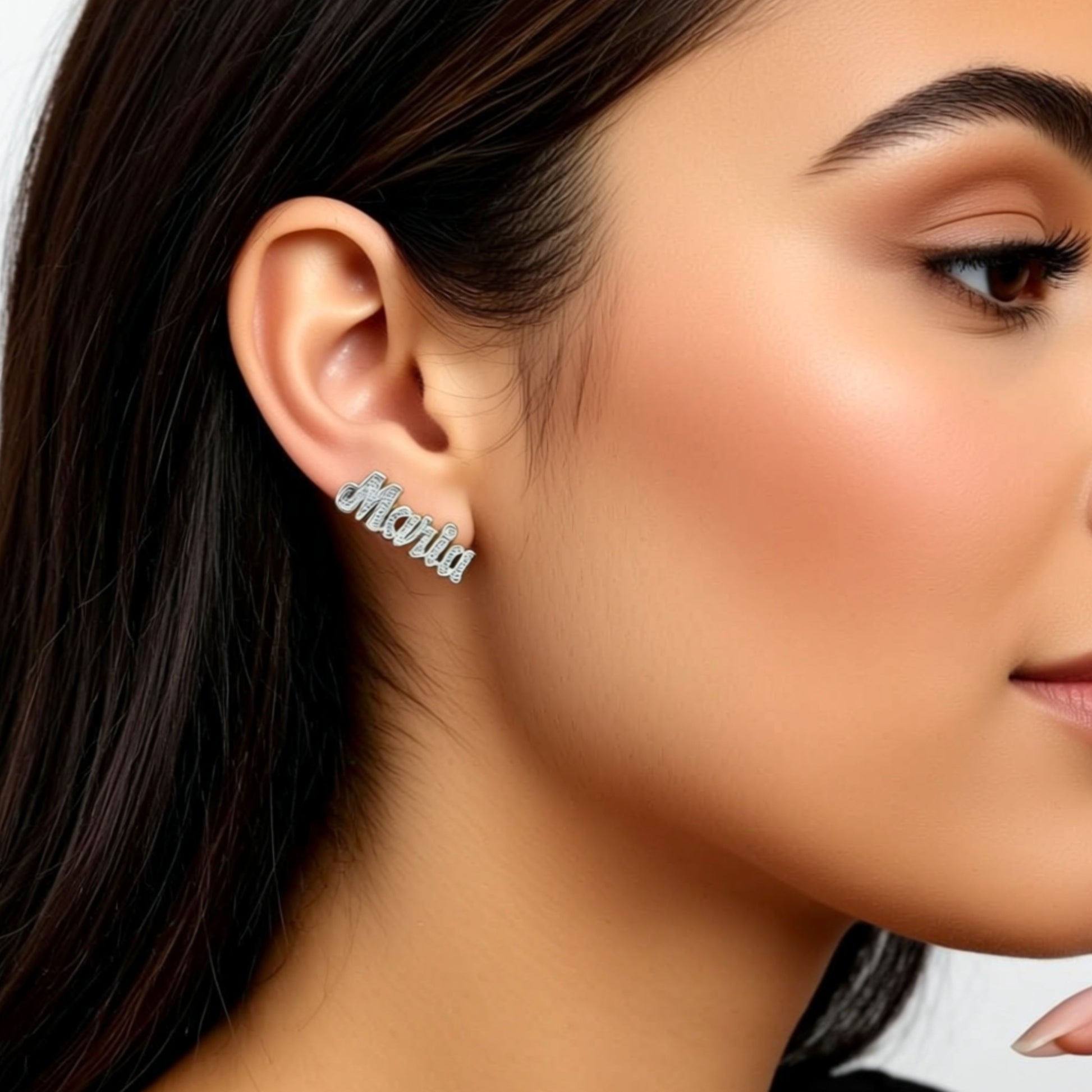 Double Plated Script Name Earrings on a person
