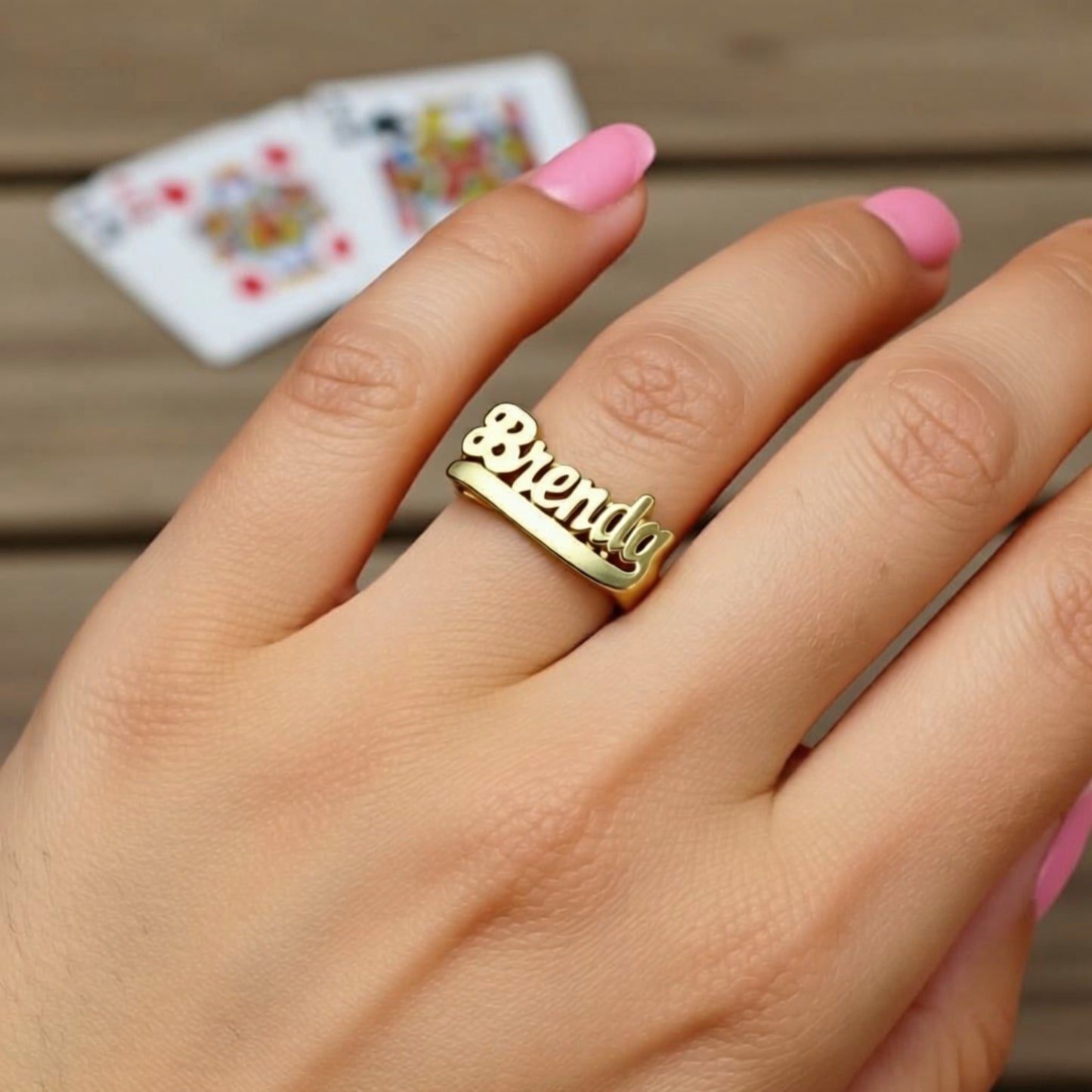 name ring on a hand