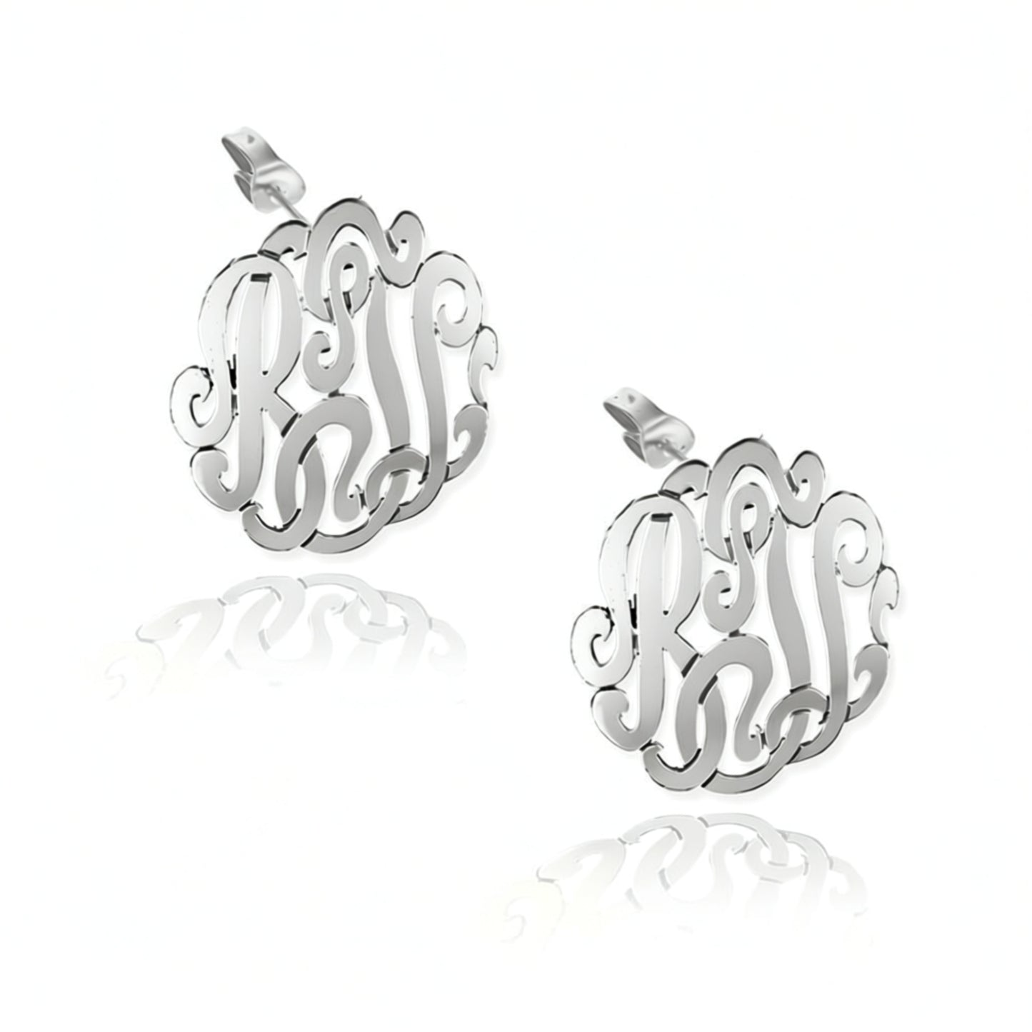 Silver monogram earrings on a white background